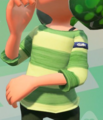 A closeup of a female Inkling wearing the Lime Easy-Stripe Shirt, showing off the tag.
