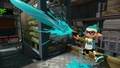 Another Inkling boy wearing the Black Seahorses, firing a Splash-o-matic.