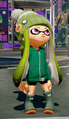 A female Inkling wearing the Green Rain Boots.