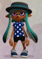 A female Inkling wearing the Pearl Tee