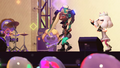 Off the Hook performing on the Seashell Stage; Pearl unusually lacks an ink tint in her tentacles