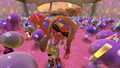 Un Inkling animando junto a medusas