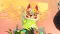 The Inkopolis Plaza kitsune statue with colored eggs and a flower crown