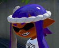 Closeup of a female Inkling wearing the Traditional Headband.