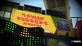A sign resembling a Tower Records advertisement in Inkopolis Square