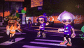 Inklings dancing in the Plaza during a Splatfest
