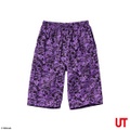 Purple kids shorts featuring various in-game graffiti and logos as a black pattern sold by Uniqlo.