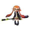 Promotional image of an Inkling girl wearing the school gear, posing with a Hero Charger Replica.