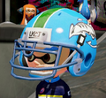 Closeup of a male Inkling wearing the Tentacles Helmet.