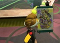 Gold Dynamo Roller in a board displaying an old Tableturf Battle logo.