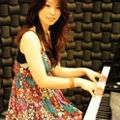 Ayako "BUN" Hatanaka (keyboards)