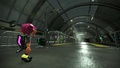 Agent 8 looking towards the subway train
