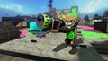 The Grim Range Blaster being held.