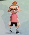 A male Inkling wearing the Shrimp-Pink Polo