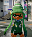 A female Inkling wearing the Green Cardigan.