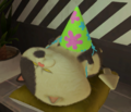 Judd wearing a party hat