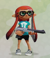 An Inkling wearing the Squid-Stitch Slip-Ons, holding an N-ZAP '85