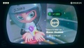 Agent 8 being awarded the Balloon mem cake upon completing the station.