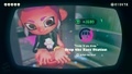 Agent 8 being awarded the Pearl mem cake upon completing the station.