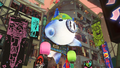 The Splatsville pig statue wearing half a colored eggshell as a hat