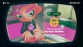 Agent 8 being awarded the Inkling Squid mem cake upon completing the station