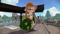 An Inkling standing with a Tri-Slosher equipped.