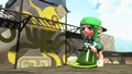 A female Octoling wearing the Squid Satin Jacket, leaning on a Tri-Slosher.