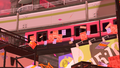 Posters on the train in Inkopolis Square during Big Run