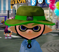 Closeup of a male Inkling wearing the Camping Hat.