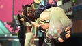 A fourth shot of Off the Hook in their costumes.