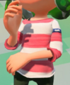 Closeup of a female Inkling wearing the Pink Easy-Stripe Shirt, showing the tag.