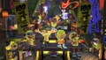 Promotional screenshot showcasing players atop Frye's float