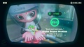 Agent 8 being awarded the Steel Eel mem cake upon completing the station