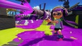 The Inkling girl firing a .96 Gal Deco is wearing the Pink Trainers.