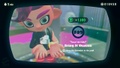 Agent 8 being awarded the Judd & Li'l Judd mem cake upon completing the station.