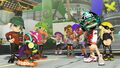 An Inkling wearing the Green Rain Boots in a promotion for returning gear during the Chill Season 2022.