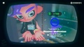 Agent 8 being awarded the Familiar Graffiti mem cake upon completing the station
