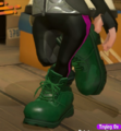 An Inkling girl trying on the New-Leaf Leather Boots.