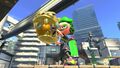 An Inkling holding the Rainmaker.