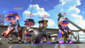 Team of top 500 players in Rank X with their crown icons, shown before battle in Splatoon 2, at Manta Maria in Splat Zones.