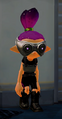A male Inkling wearing the Octoling Gear. Note that no midriff is showing.