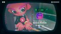 Agent 8 being awarded the Toni Kensa mem cake upon completing the station