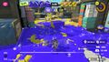 Screenshot of An Octoling with the Dynamo Roller approaching the Splat Zone.