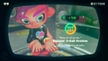 Agent 8 being awarded the Flyfish mem cake upon completing the station