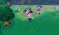 A player alongside Cece wielding matching umbrellas