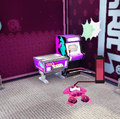 An Inkling looks at an arcade machine at Ancho-V Games.