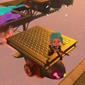 The player standing on a Fuzzy Octomissile's platform.