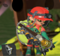 An Octoling holding the Grizzco Stringer