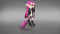 Another promotional image of an Inkling girl wearing the Splatoon school gear, holding a .52 Gal Deco.