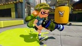 A female Inkling wearing the Blue Lo-Tops, holding an L-3 Nozzlenose.